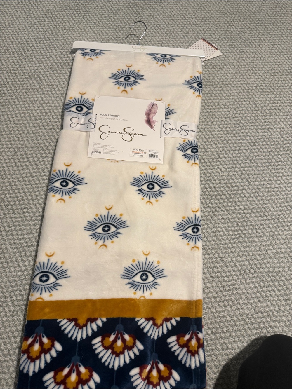 Jessica Simpson Cream Plush Throw blanket with Navy & Mustard Patterned Motifs
